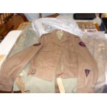 A vintage Commando uniform, together with several