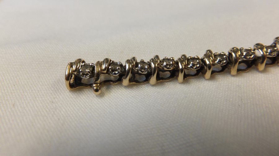 A 9ct gold diamond mounted 'Tennis' bracelet - Image 5 of 6