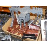Medley of semi-assembled Games Workshop Warhammer 40000 terrain pieces, including munitorum armour
