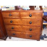 A Victorian dark wood chest of draws comprising tw