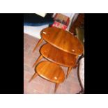 A nest of three Ercol 'Pebble' tables