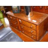 A six drawer mahogany collector's chest