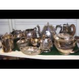 A collection of silver plated and other tea ware