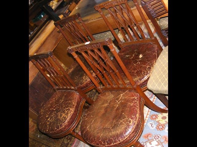 A set of four 19th century ship's saloon chairs wi