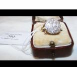 A large diamond cluster ring (over 1 carat total d