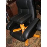A swivel reclining chair with foot stool