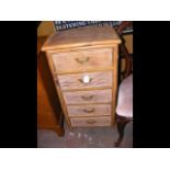 A small antique five drawer bamboo chest of drawer