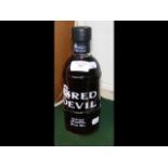 A bottle of Bells Red Devil red hot spirit whiskey