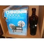 Two vintage bottles together with a Chinon Cine-pr