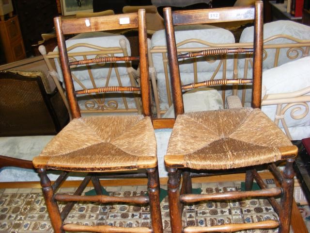 A pair of country chairs