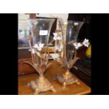 A pair of decorative 36cm high metal and glass vas