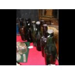Three early collectable wine bottles, including Me
