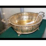 A silver gilt two handled fruit bowl of ornate pie