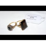 A smoky quartz style ring in gold setting, togethe