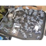 A cluster of assembled Games Workshop Warhammer 40000 and Warhammer Age of Sigmar miniatures, includ