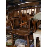 A Windsor stick back armchair with elm seat
