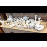 An assortment of souvenir china including two Firs