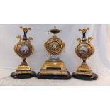 A Victorian, exhibition quality, three piece clock