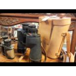 Two pairs of binoculars, one cased