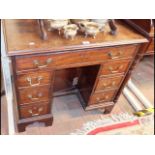 A Georgian mahogany lady's writing desk with seven