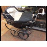 A Silver Cross vintage pram in black