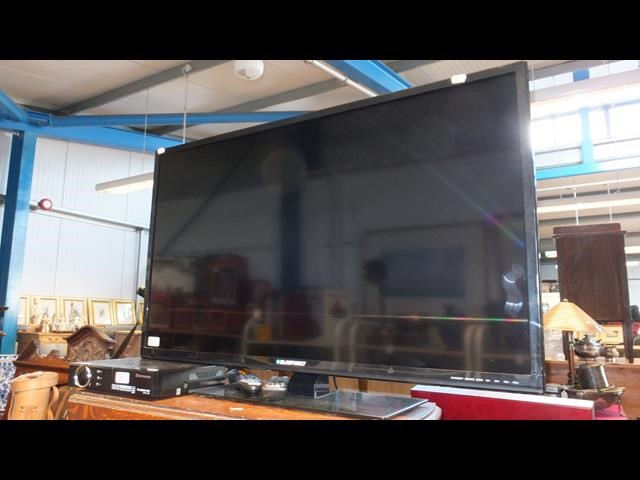 A Blaupunkt 40 inch flatscreen TV complete with re