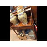 A reproduction mahogany roll top desk with two dra