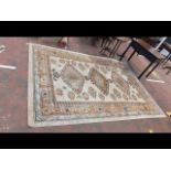 A Middle Eastern carpet with geometric border and