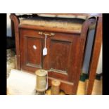 A Victorian walnut piano stool with drop front