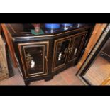 A decorative oriental sideboard with relief work d