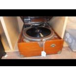 A vintage HMV gramophone in walnut case - the need