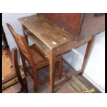 An old school desk with chair