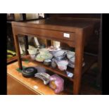 A mahogany two tier coffee table