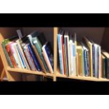 Two shelves of of Isle of Wight interest books inc