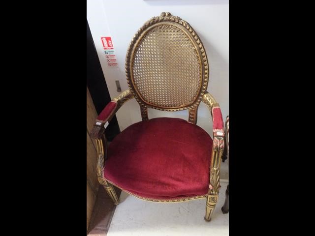 A gilt framed French style armchair