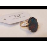 A 9ct gold ring with single black Doublet opal?