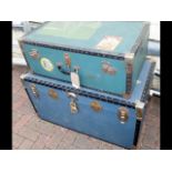 A vintage travelling trunk and one other