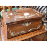 A Victorian Mother-of-Pearl inlaid tea caddy with