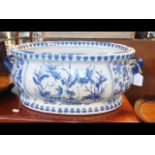 A Victorian blue and white glazed foot bath