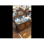 A Victorian walnut dressing table, bevelled mirror