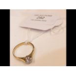 A diamond Solitaire ring in 18ct gold setting