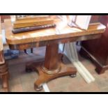 A 19th century rosewood fold-over games table on s