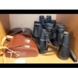 Two pairs of leather cased Carl Zeiss binoculars,