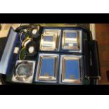 A collection of silver plated photo frames and P&O