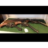 A pair of replica revolvers etc