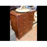 A Victorian cap top mahogany chest of drawers