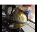 An antique French brass Fireman's helmet