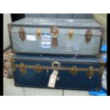 A vintage travelling trunk and one other