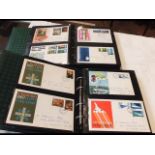 A collection of GB First Day Covers in two a