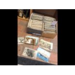 Two boxes of vintage and other postcards